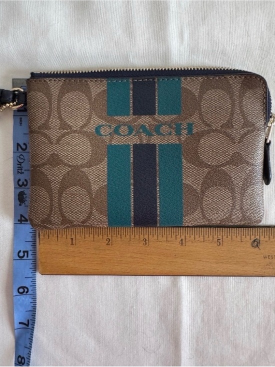 Coach Handbags - COACH VARSITY LG Wristlet KHAKI/MIDNIGHT F66463